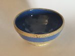 blue and taupe ceramic bowl